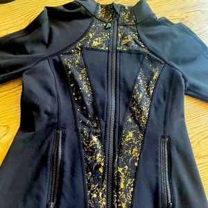 Ivivia size 12 girls define jacket with gold detail. Only worn once